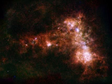 This image shows the Small Magellanic Cloud galaxy in infrared light from the He