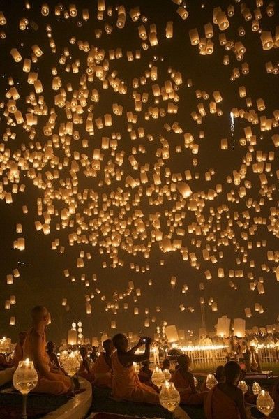 Wedding Flying Paper Lanterns- Each guest gets to tie a tag on a lantern with a
