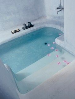 a bathtub that is sunk into the floor! It's like a pool in your bathroom!