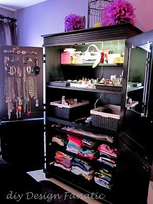 converting an old entertainment center in to a wardrobe…