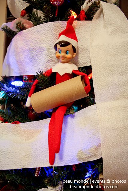 elf rolls the tree … love the idea of creating mischievous situations like the