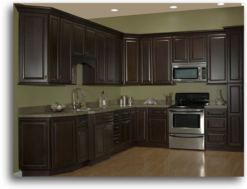 espresso stained cabinets -   Espresso-stained kitchen cabinetry.