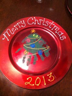 These are decorative plates designed with handprints of my kids. :) -   Handprint plates ideas