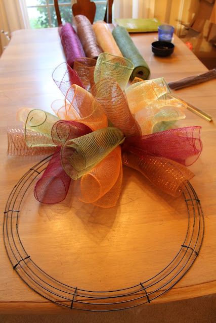 maybe in christmas colors??? :) How To Make A Curly Deco Mesh Wreath – this is s