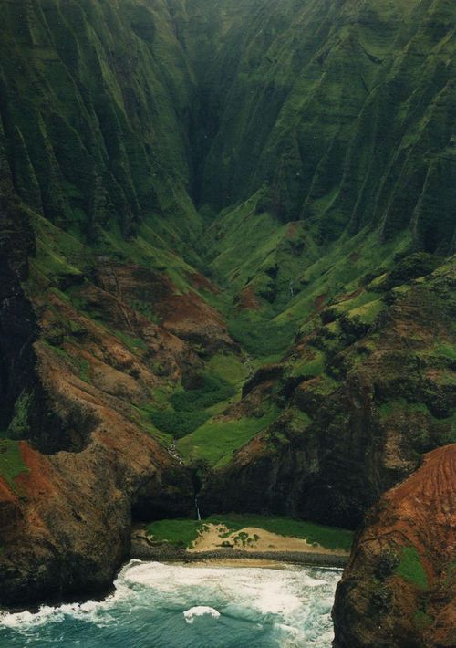 na pali . saw it from a helicopter with no side windows or doors . breathtaking
