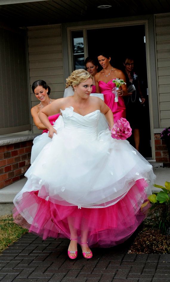 put the color of the bridesmaids dress underneath your dress.
