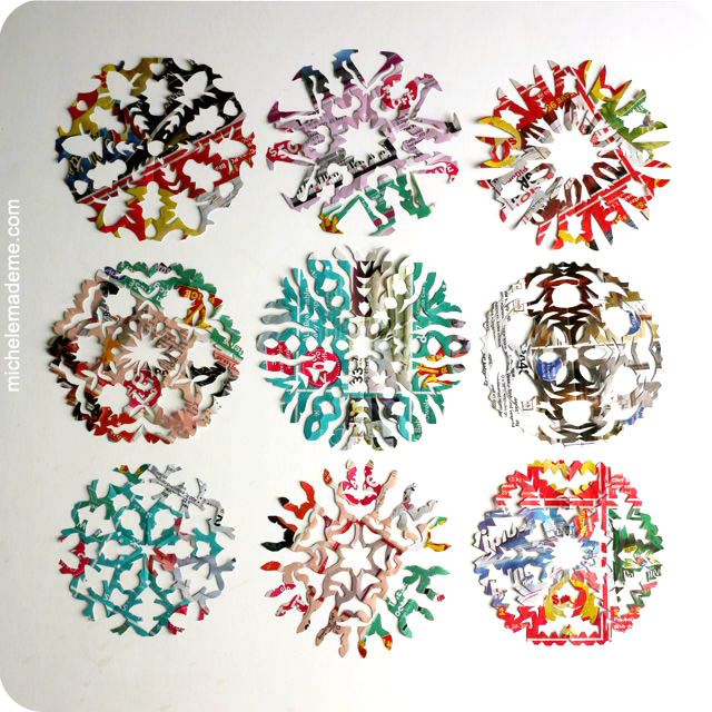 snowflakes cut out of magazines