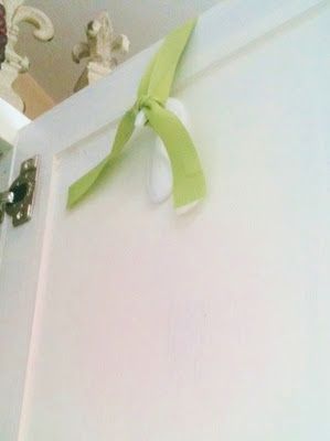 upside down command hook. How to hang a Wreath on a cabinet door.