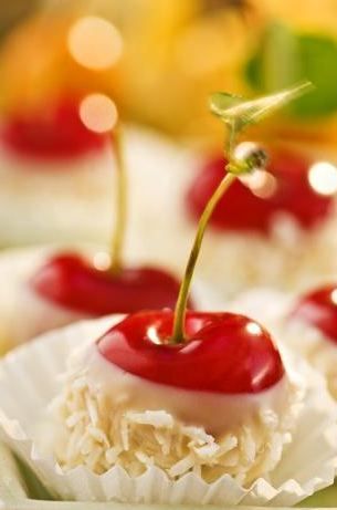 Cherries dipped in white chocolate… Yum!