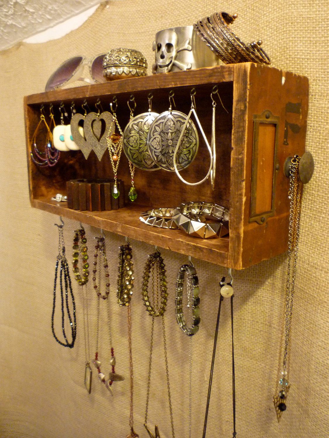 DIY – you could easily make this with a vintage drawer and some C-hooks;   Upcyc