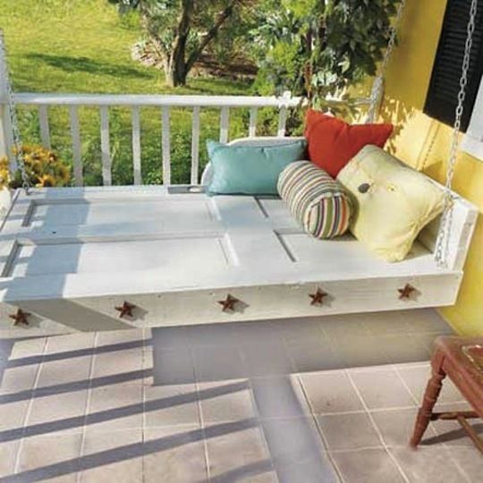 Daybed swing made from an old door