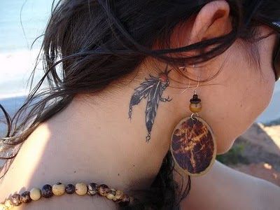 Feather tattoo behind ear