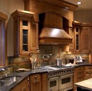 Log Home Kitchen – I like this one – Seems extravagant – but to cook here!