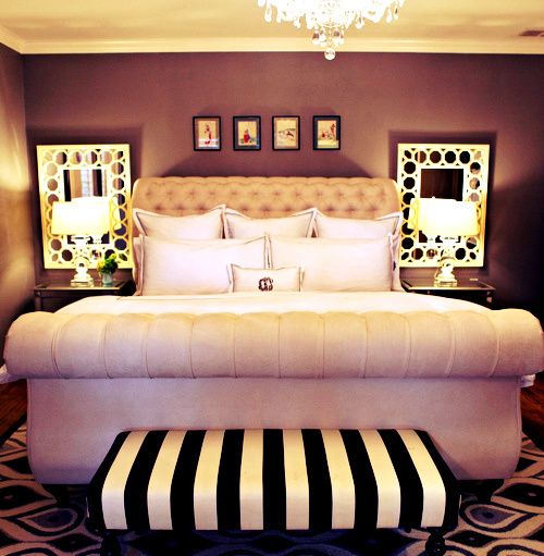 Mirrors behind the bedside lamps. Doubles the light in the room- clever!!