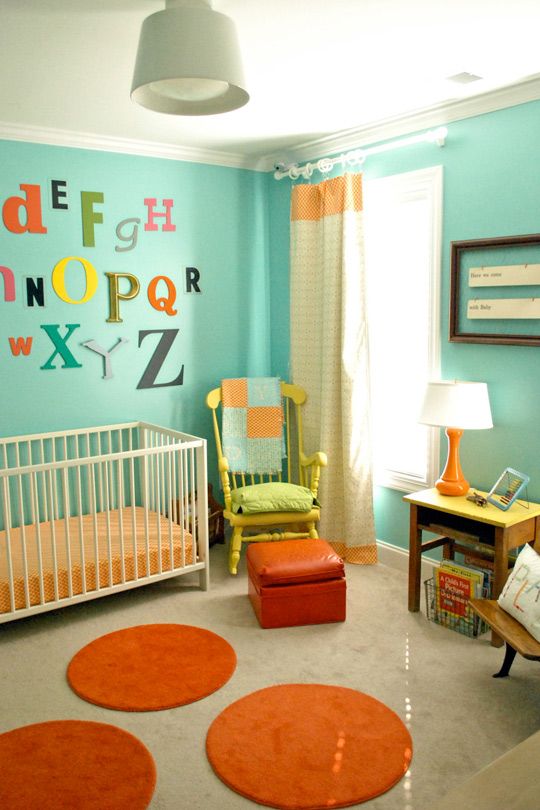 Nursery decor. Like the bright colors and wall letters. Would probably trip over