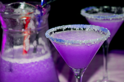 Purple Martini 3 oz Vodka 1 1/2 oz cranberry juice ½ oz blue Curacao liqueu