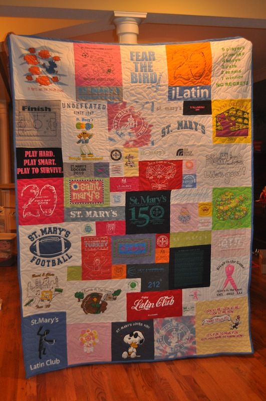 T shirt quilt – i like this version with different sized squares!