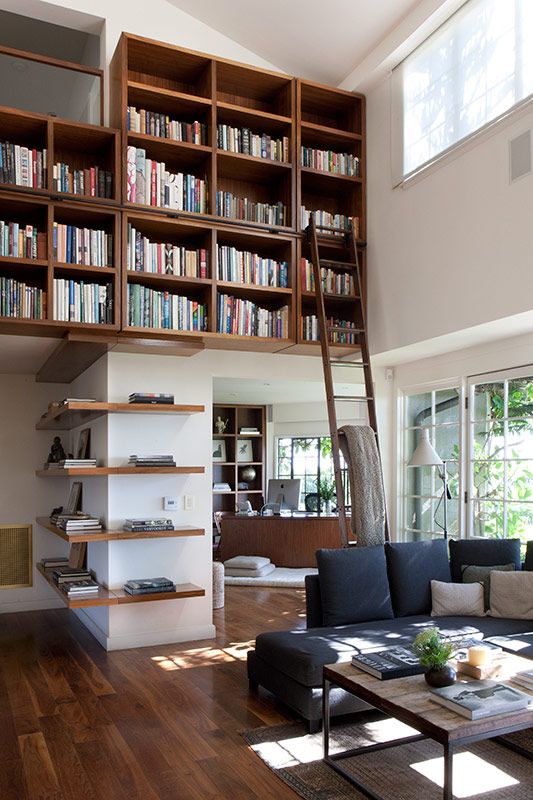 This room via Paul Raeside is amazing!  I love the wrap around shelves and the s