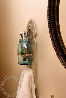 Toothbrush and towel holder out of a mason jar, fence post, and doorknob!