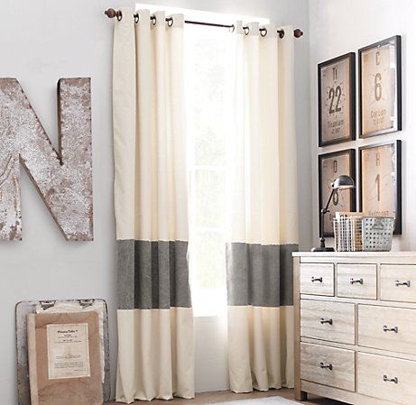 buy curtains and then cut them and put a strip of fabric in-between