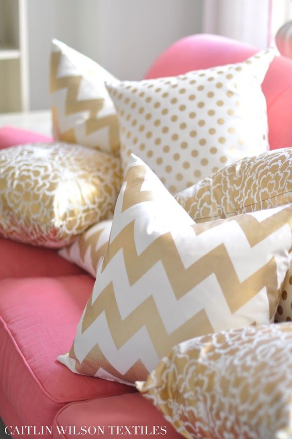 gold patterned throw pillows