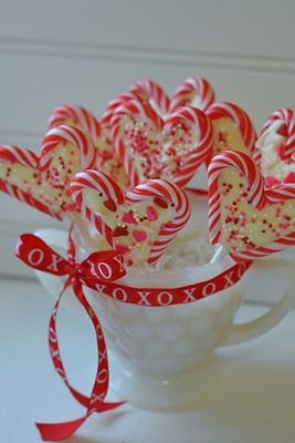 make these every year :) they are so easy and cute  set 2 mini-candycanes into h