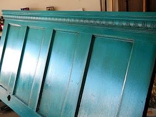 old door as headboard… just add crown molding and paint!