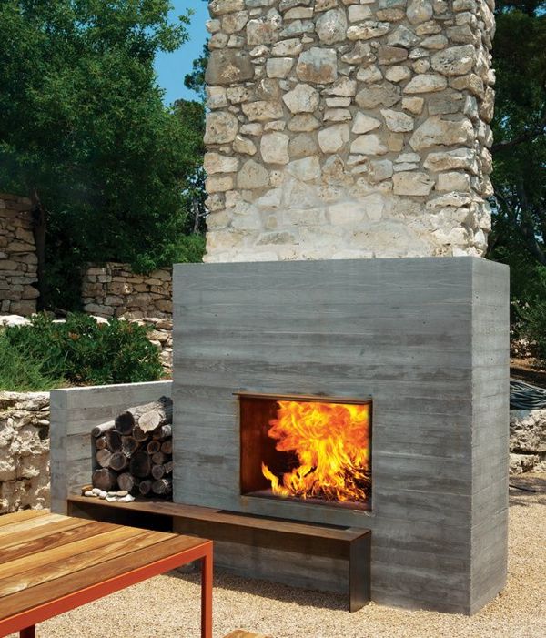 boxy outdoor fireplace in dwell the design -   Outdoor Fireplace Ideas