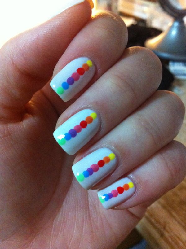 rainbow of dots like the design of row of dots but not sure on white nails and d