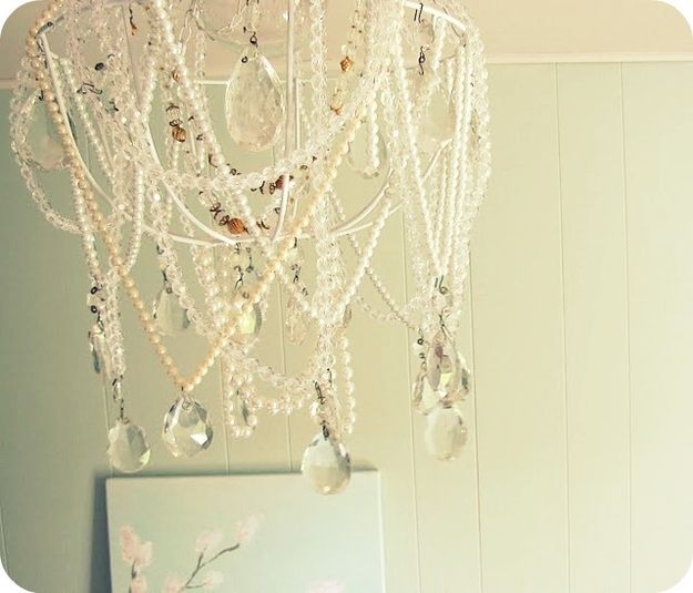 Someone made a crazy chandelier out of broken necklaces. -   How To Reuse Your Broken Things