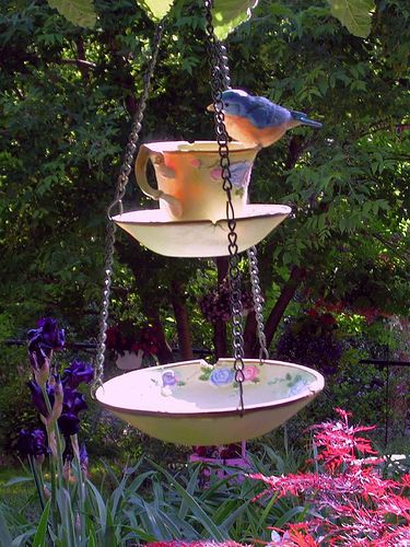 A chipped teacup makes a really cute bird feeder. -   How To Reuse Your Broken Things