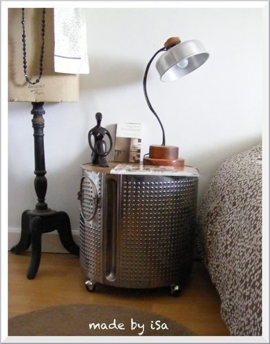 An old washing machine drum makes an industrial-looking nightstand. -   How To Reuse Your Broken Things