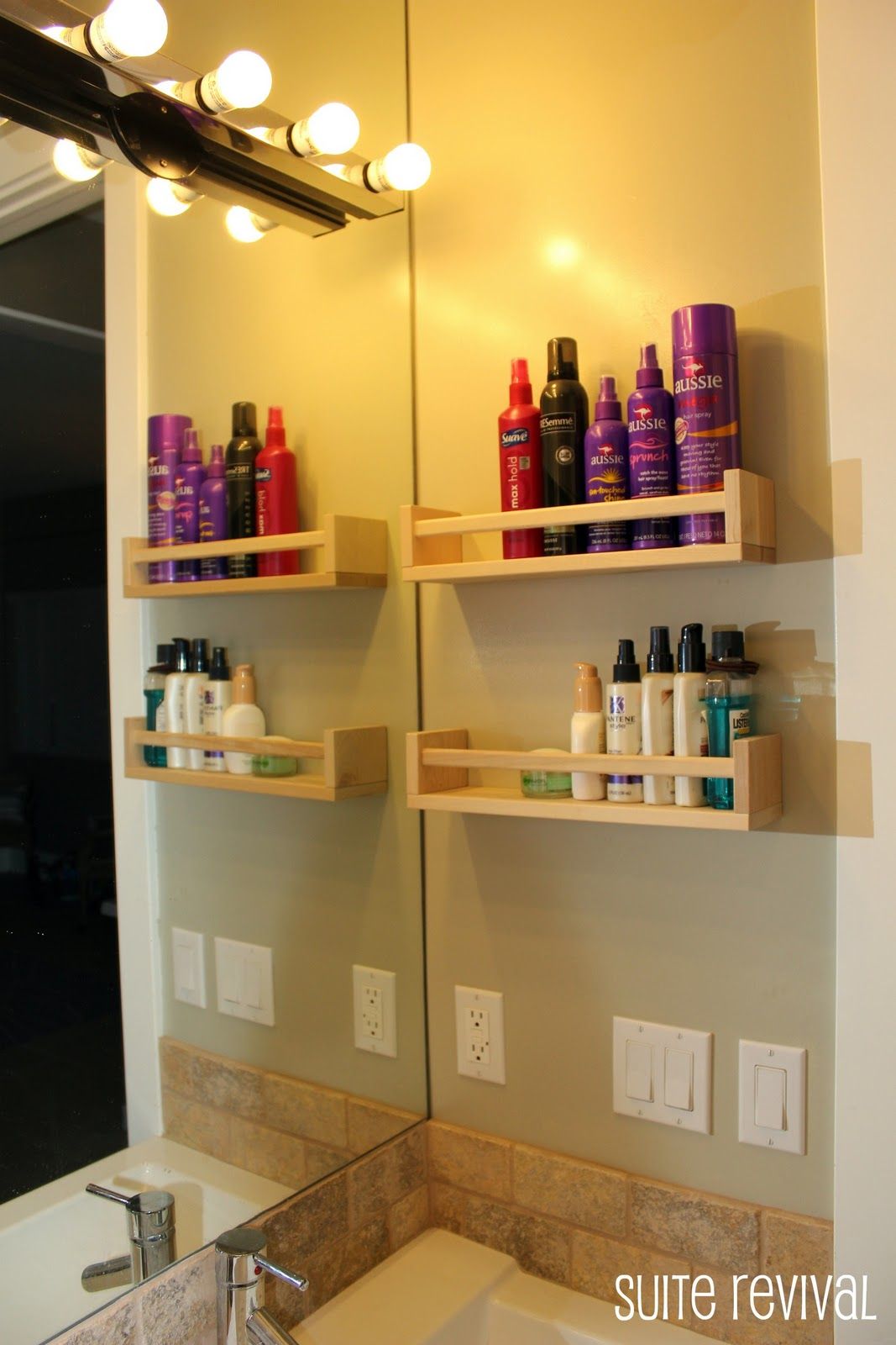use spice racks as shelves in the bathroom better organize and get stuff off the