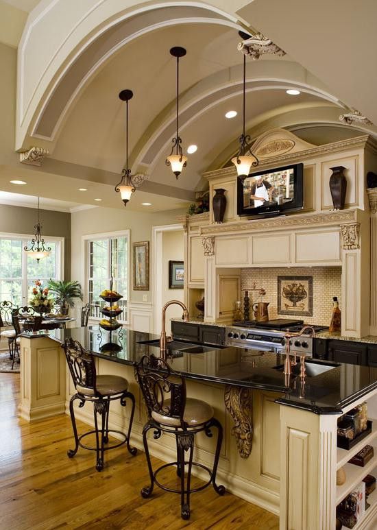 white/cream kitchen with black granite counter tops