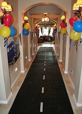 Cars party or Hot Wheels party – use a black runner and add white lines to make