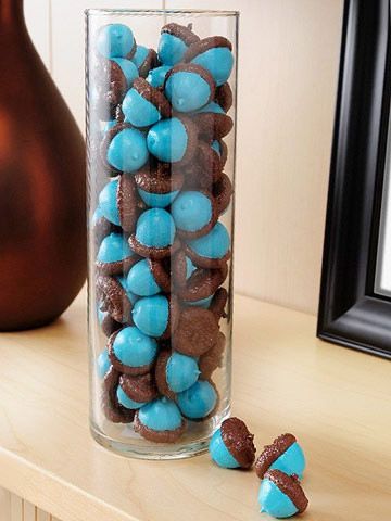 Gather falling acorns and paint them your favorite vibrant color. Toss in a clea
