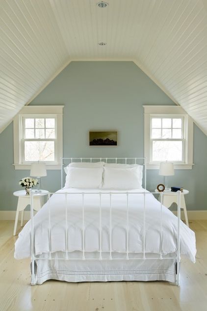 In this calming room by Aquidneck Properties, the walls are painted in Benjamin