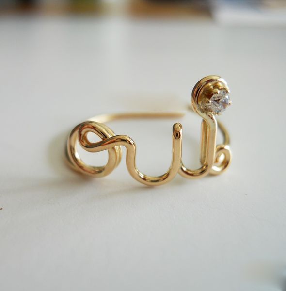 "Oui" ring by Demi Corbett  I would so give this to my French Teacher!
