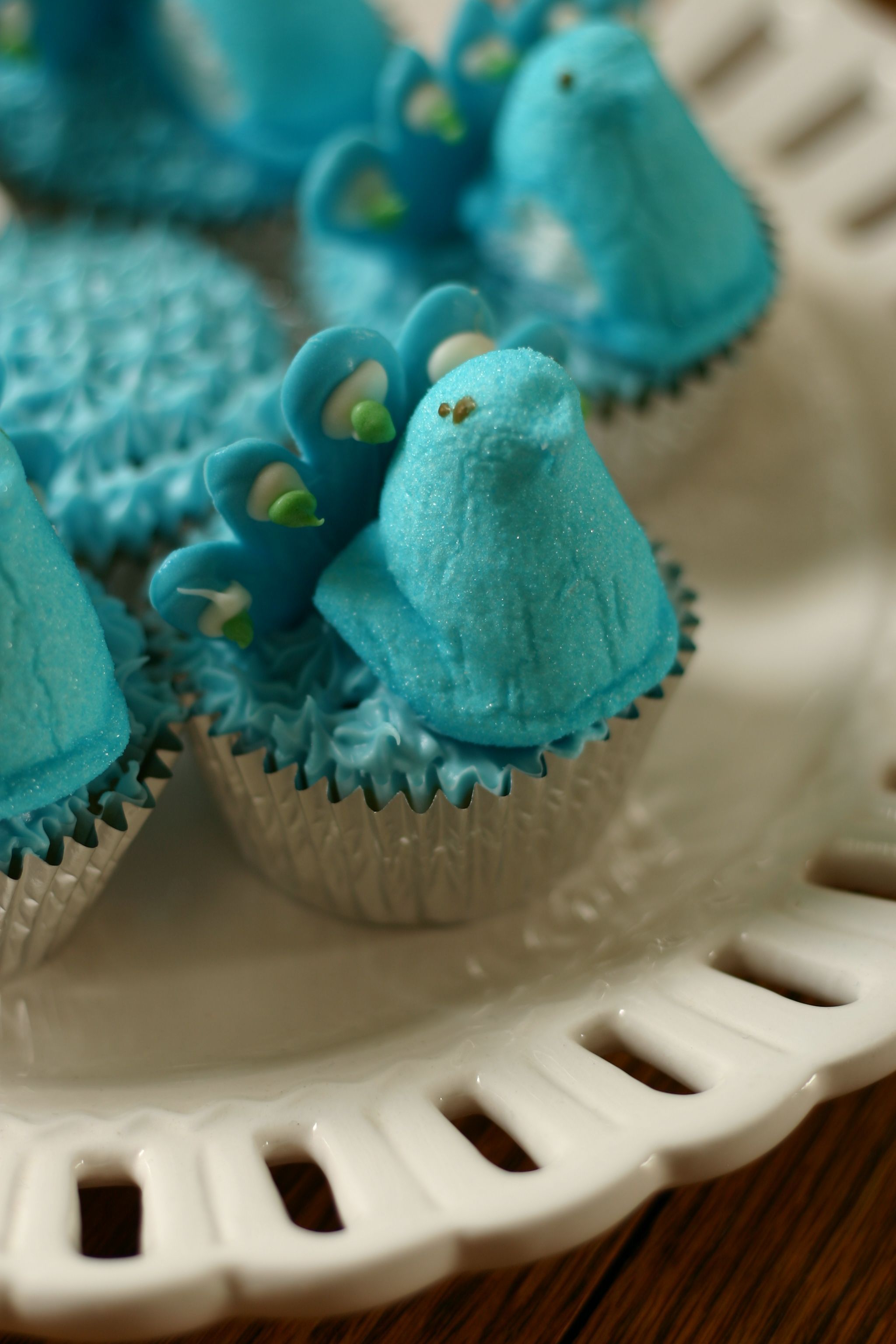 Peeps peacock cupcake with "recipe": box cake mix + spray can frosting