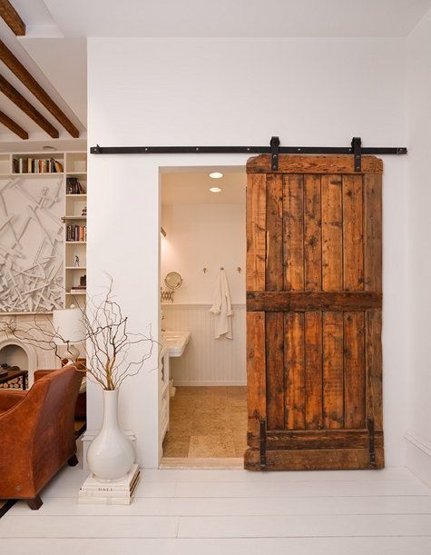 Rustic look – Space saving.  Great use of vintage door! I really like this would
