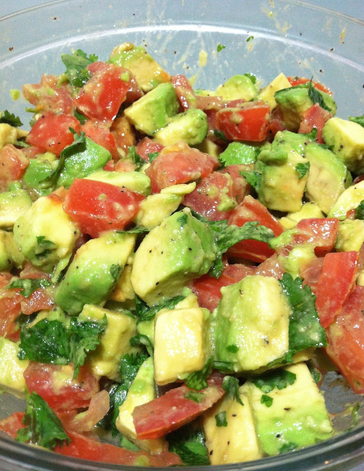 This is AWESOME!!! Avocado Tomato Salad. salt, pepper & olive oil. we eat th
