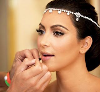 This site has a list and details of the makeup that Kim K used on her wedding da