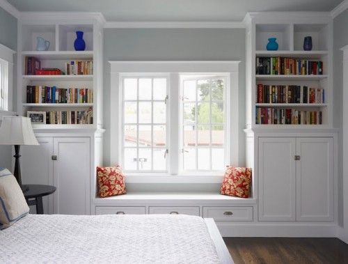 Why not put book cases on either side of a window and create a nook?