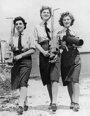 World War 2: Three members of WAAF, (Women's Auxiliary Air Force), equipped