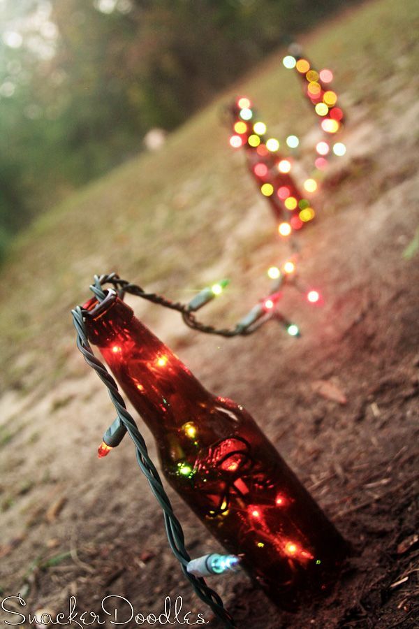 beer bottle christmas decor ~ cute for an outdoor party to lead the way
