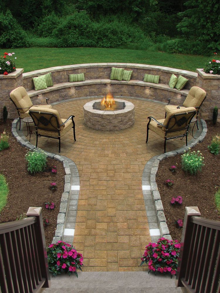 fire pit with built in seating.. So pretty