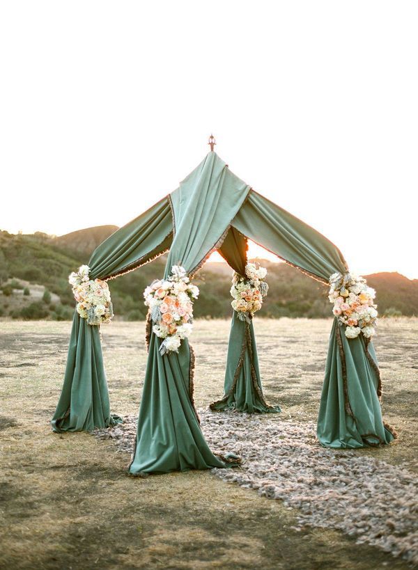 get a small tent frame and drape a fabric of your choice across then dress up wi