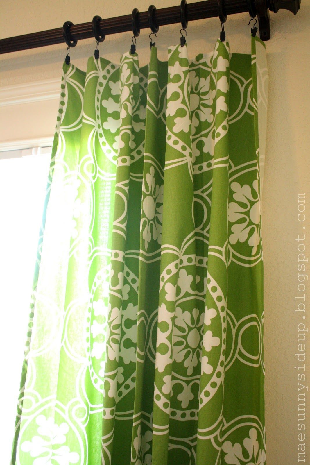 60 X 84 tablecloths as curtain panels for sliding glass doors. So much cheaper t