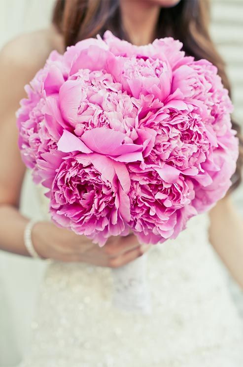 A traditional bouquet gets a bold touch when a classic nosegay is formed out of