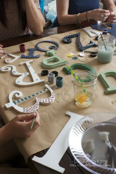 Baby shower idea: everyone gets a wooden letter and decorates them for the ABC w